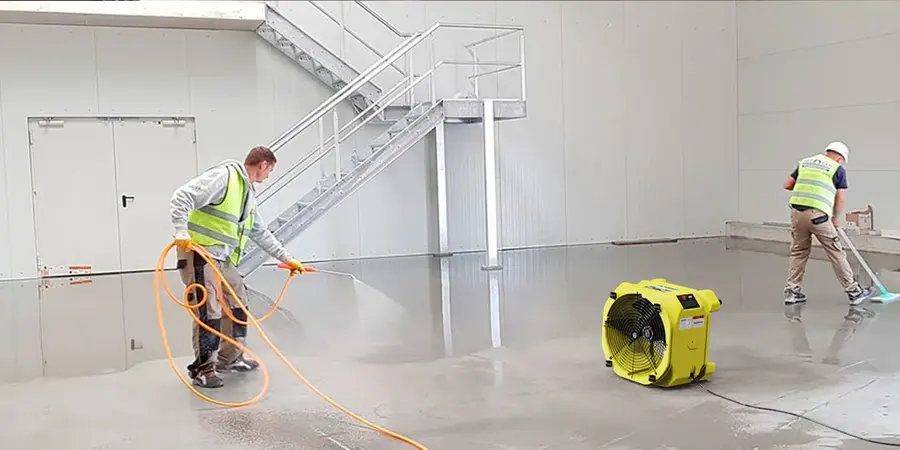 A restoration crew drying a large South Bay space in Hawthorne, CA