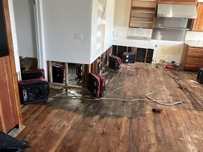 Burst pipe water damage on a buckled floor in a Hawthorne, CA home